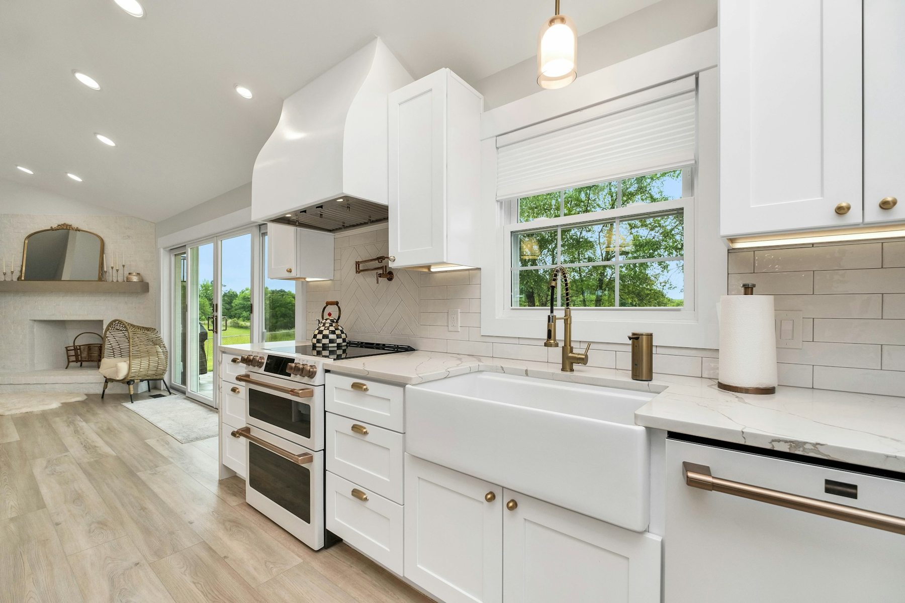 Bright kitchen with white shaker cabinets